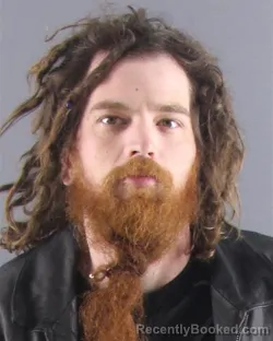 Mugshot of NOAH C M BLOOM booked in Peoria County, Illinois on April 6, 2026