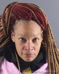 Mugshot of KYSHA R WOODARD booked in Peoria County, Illinois on April 7, 2026