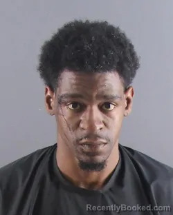 Mugshot of DEONTE L MOORE booked in Peoria County, Illinois on April 10, 2026