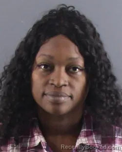 Mugshot of ZANECKIA Y BROWN booked in Peoria County, Illinois on April 11, 2026