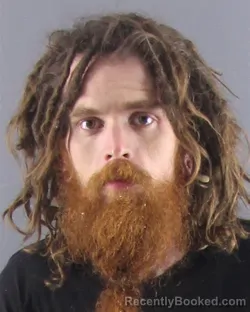 Mugshot of NOAH C M BLOOM booked in Peoria County, Illinois on April 15, 2026