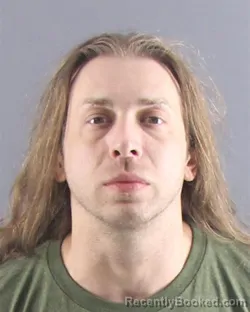 Mugshot of JESSE A BARNETT booked in Peoria County, Illinois on April 15, 2026