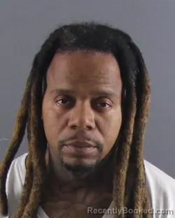 Mugshot of TSHOMBE C SAIN booked in Peoria County, Illinois on April 16, 2026