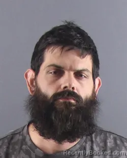 Mugshot of CHRISTOPHER R RUNYON booked in Peoria County, Illinois on April 16, 2026