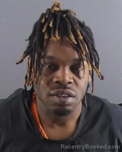 Mugshot of TAKHARI M JOHNSON booked in Peoria County, Illinois on April 18, 2026