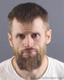 Mugshot of MATTHEW ROBERT BOUSEK booked in Peoria County, Illinois on April 20, 2026