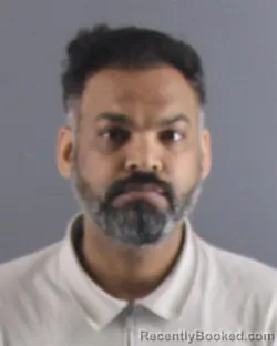 Mugshot of ARVIND S CHAUHAN booked in Peoria County, Illinois on April 25, 2026