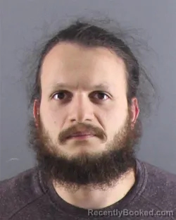 Mugshot of ALAADEAN BELAL KATTOM booked in Peoria County, Illinois on May 13, 2026