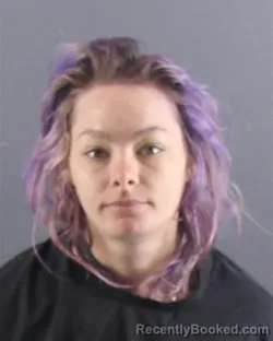 Mugshot of Tabitha Evelyn Marie Burrell booked in Peoria County, Illinois on August 23, 2026