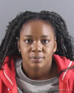 Mugshot of Shaquia L Evans booked in Peoria County, Illinois on August 31, 2026