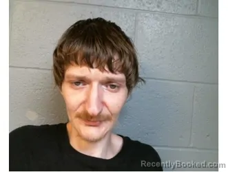 Mugshot of Travis Bednarz booked in Perry County, Illinois on April 16, 2026