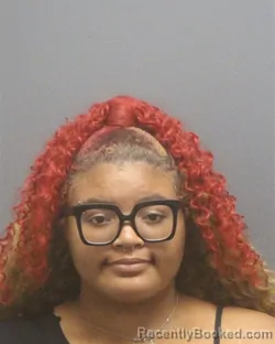 Mugshot of Ariel Dominque Amos booked in Guilford County, North Carolina on September 3, 2026