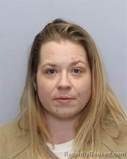 Mugshot of AMBER BRITTANY CREWS WARDEN booked in Guilford County, North Carolina on March 25, 2026