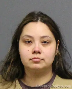 Mugshot of ASHLEY ABIGAIL ESPINO booked in Guilford County, North Carolina on May 24, 2026