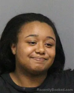 Mugshot of Autumn Carmela Evans booked in Guilford County, North Carolina on August 21, 2026