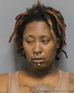 Mugshot of ADORA LYRIE FUTRELL booked in Guilford County, North Carolina on March 14, 2026