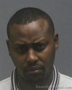 Mugshot of ALAIN MUHOZA booked in Guilford County, North Carolina on July 14, 2026