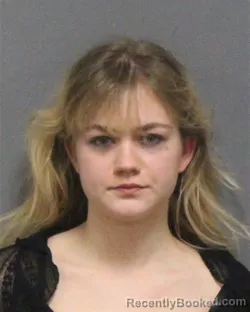 Mugshot of AMELIA MONROE MOORE booked in Guilford County, North Carolina on April 2, 2026