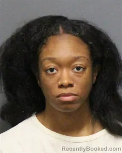 Mugshot of ALEXUS BREANN NEAL booked in Guilford County, North Carolina on March 30, 2026