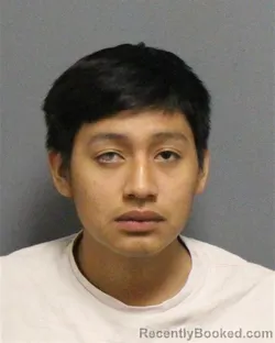 Mugshot of Angel Geovanny Junior Perez-Enriquez booked in Guilford County, North Carolina on August 20, 2026