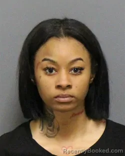 Mugshot of ARMONI CHARDE` THOMAS booked in Guilford County, North Carolina on March 27, 2026