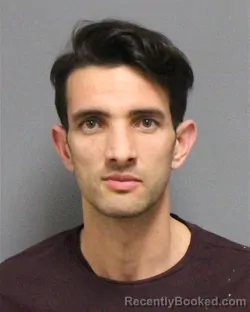 Mugshot of BASIR AMIRI booked in Guilford County, North Carolina on March 25, 2026