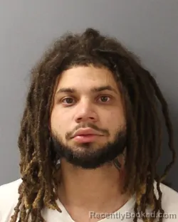 Mugshot of Cameron Lee Cardenas booked in Guilford County, North Carolina on August 27, 2026