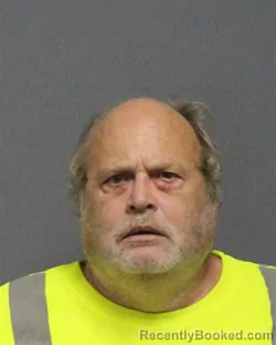 Mugshot of Carroll Wayne Hinkle booked in Guilford County, North Carolina on September 11, 2026