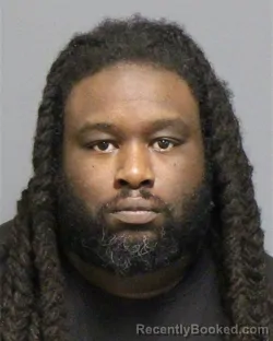 Mugshot of Christopher Douglas Lindsey booked in Guilford County, North Carolina on August 26, 2026