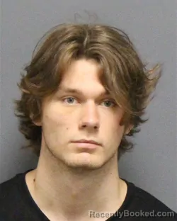 Mugshot of CHRISTOPHER ALLEN MACMILLAN booked in Guilford County, North Carolina on July 5, 2026
