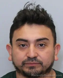 Mugshot of DENIS JOSE CARACAMO-ORTIZ booked in Guilford County, North Carolina on March 29, 2026