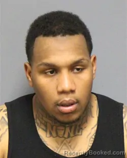 Mugshot of DOMINIQUE TYRONE LESANE booked in Guilford County, North Carolina on March 15, 2026