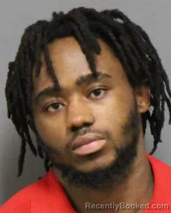 Mugshot of DOMICIEN MULOCO MUKOMA booked in Guilford County, North Carolina on March 24, 2026