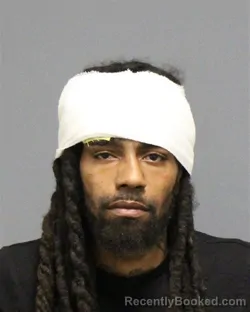 Mugshot of DIQUAN WASHINGTON SHARP booked in Guilford County, North Carolina on March 28, 2026