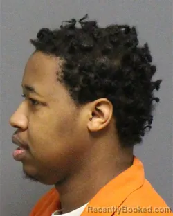 Mugshot of Ernez Tomaz Austin booked in Guilford County, North Carolina on August 25, 2026