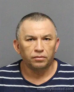 Mugshot of EDWIN ALFREDO PARADA booked in Guilford County, North Carolina on June 17, 2026