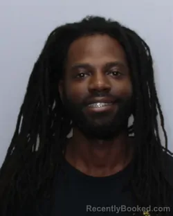 Mugshot of EVARD FRANCOIS WHITFIELD booked in Guilford County, North Carolina on April 12, 2026