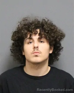 Mugshot of HOLDEN SHAHIEN MOINOSSADAT booked in Guilford County, North Carolina on July 1, 2026