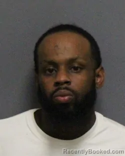 Mugshot of IMMANUEL TASHAWN NIMMONS booked in Guilford County, North Carolina on July 1, 2026