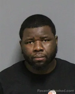 Mugshot of JUSUFU DUNZO booked in Guilford County, North Carolina on March 24, 2026