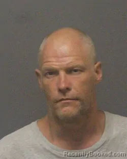 Mugshot of Justin Anthony Kirkman booked in Guilford County, North Carolina on August 22, 2026
