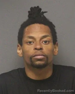 Mugshot of JOHN CORNELIUS MEDLEY booked in Guilford County, North Carolina on March 14, 2026