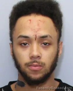 Mugshot of JAYLEN DEVON THOMPSON booked in Guilford County, North Carolina on March 26, 2026