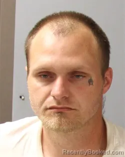 Mugshot of JUSTIN CRAIG WOOD booked in Guilford County, North Carolina on May 27, 2026
