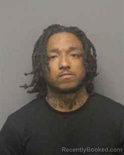 Mugshot of JUSTICE LAMONT WILLIAMS booked in Guilford County, North Carolina on March 31, 2026