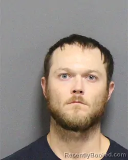 Mugshot of KEVIN EDWARD COOK booked in Guilford County, North Carolina on July 8, 2026