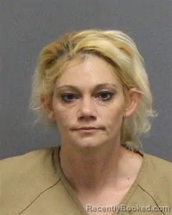 Mugshot of Kelly Michelle Charles booked in Guilford County, North Carolina on August 28, 2026