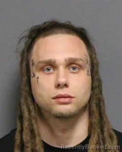 Mugshot of KEVIN LEE HARRINGTON booked in Guilford County, North Carolina on March 19, 2026