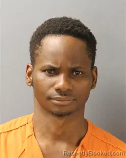 Mugshot of KALIHASE MIGOMBANO booked in Guilford County, North Carolina on May 24, 2026