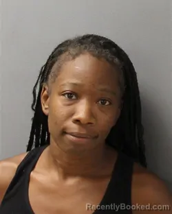 Mugshot of KENISHA MONIQUE MOORE booked in Guilford County, North Carolina on June 29, 2026